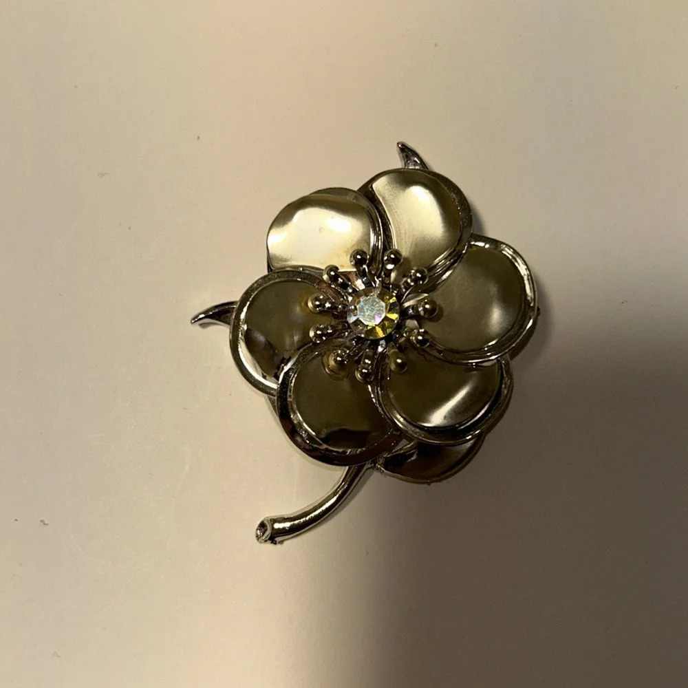 Silver Matte and Glossy Flower Brooch with a Aurora borealis Crystal
